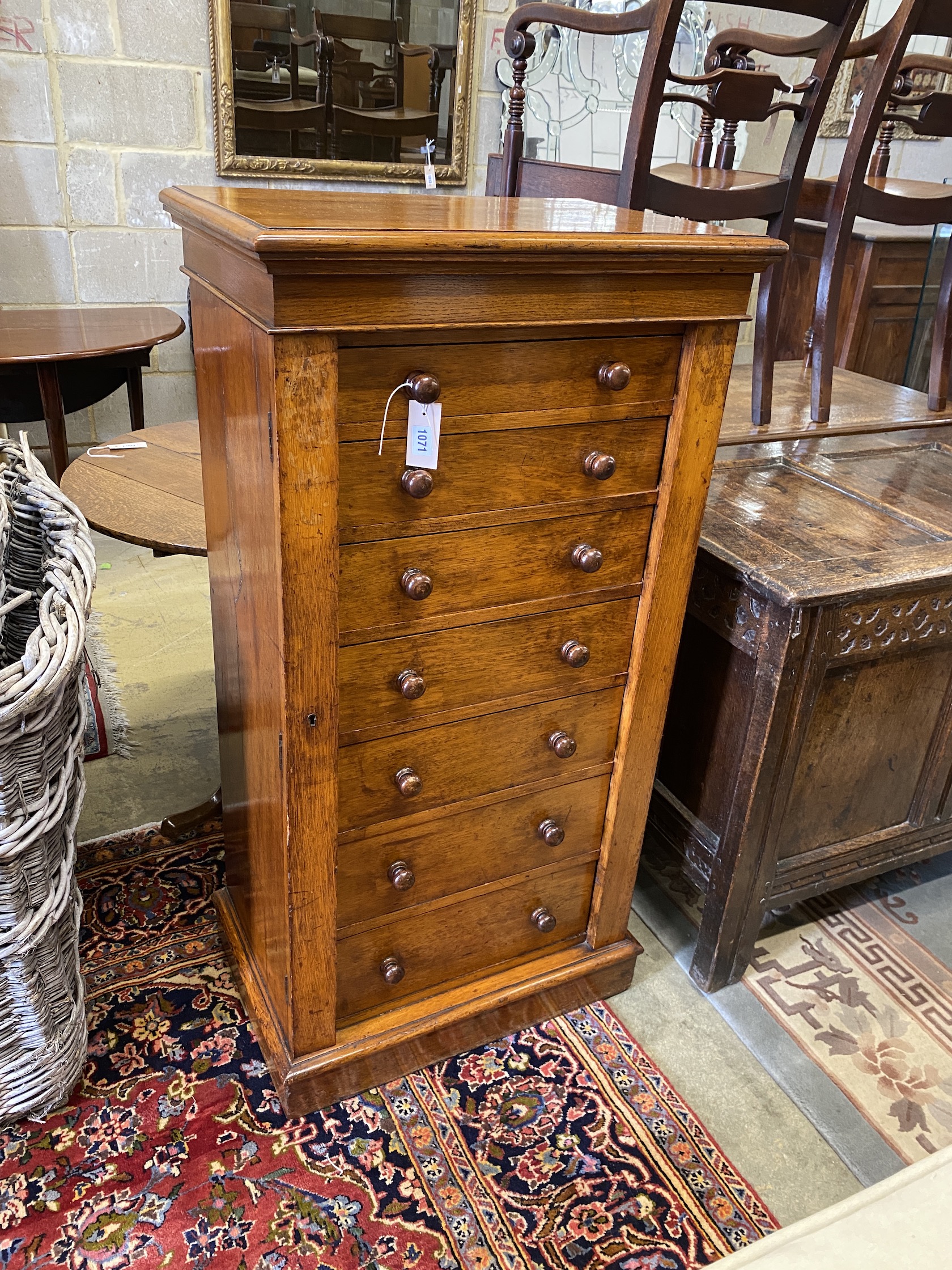 A Victorian oak Wellington chest, width 61cm, depth 42cm, height 120cm